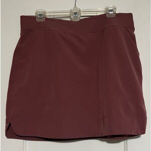 32 cool skirt with attached shorts, mauve. Size L